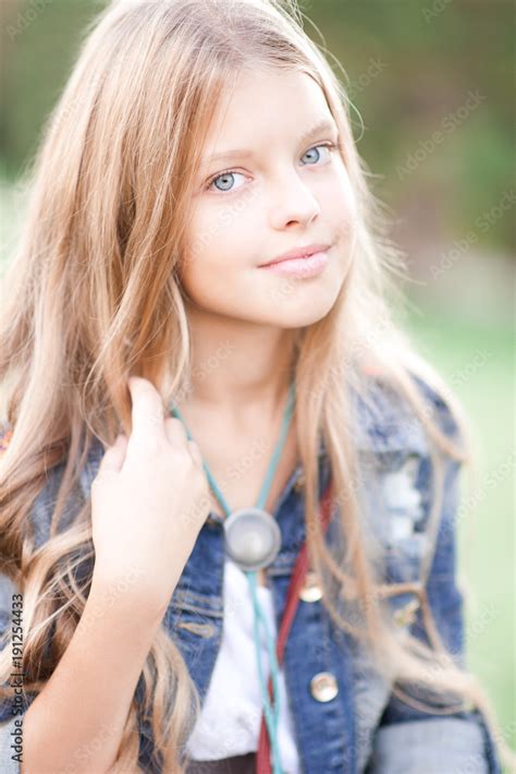 Smiling Blonde Teenage Girl 14 15 Year Old With Long Hair Posing