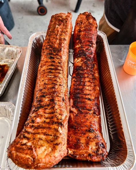 Place the seasoned pork loin roast on the grill, fat side up. Tip from Traeger Pitmaster Curtis on grilling a whole Pork ...