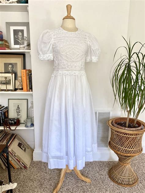 Engagement session at locations from the movie (500) days of summer, captured by marissa rodriguez photography. Vintage White cotton and linen wedding Dress / Summer day ...