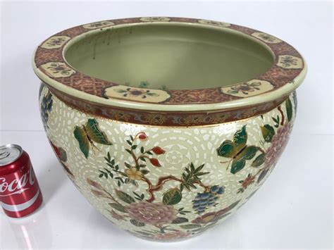 What are the colors of a fishbowl planter? JUST ADDED - Contemporary 14' Chinese Fish Bowl Planter