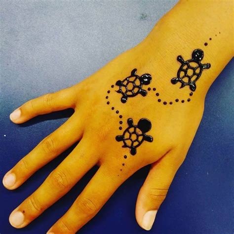 Learn about the dolphin tattoo, dolphin tattoo meanings, dolphin tattoo ideas, and view all our tattoo photos. Fine Simple mehndi design for kids by @ orlandofl_henna ...