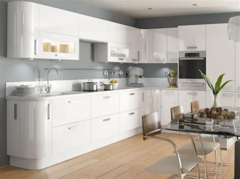 A modern white kitchen looks bright and light, calm and neutral. White kitchen ideas - elegant and modern kitchen interiors