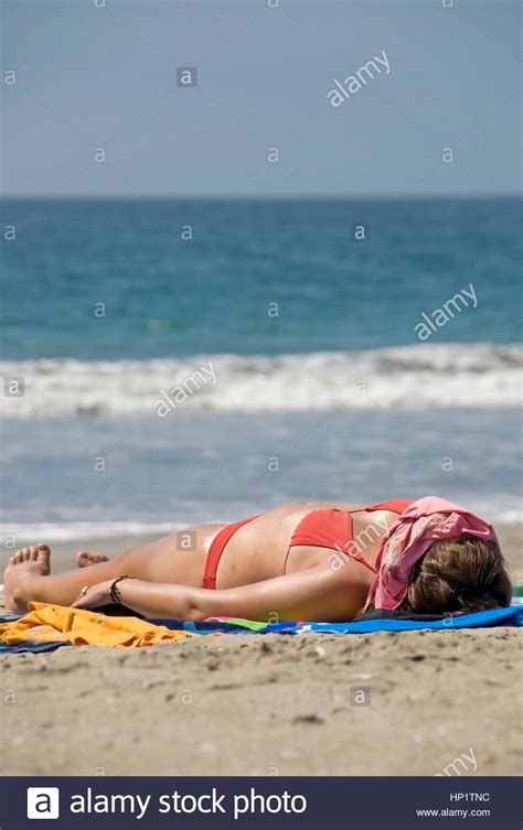 Women In Bikinis At The Beach Woman In Bikini At Hi Res Stock