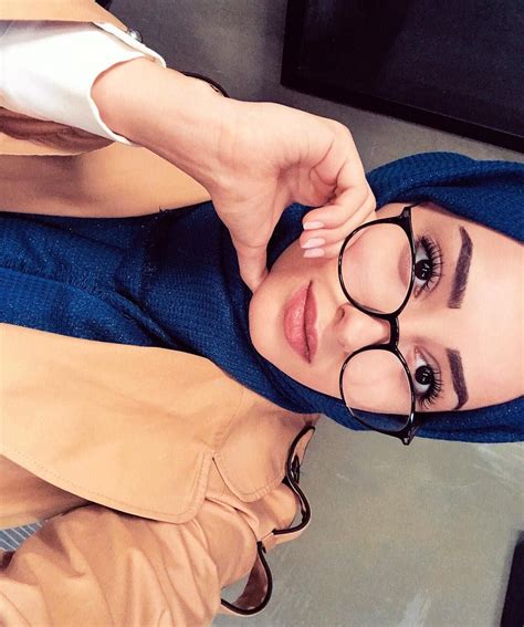image may contain one or more people eyeglasses and closeup hijab fashion close up log