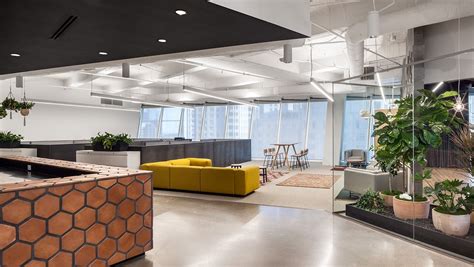 A Look Inside Team Ones Modern Dallas Office Green Office Walls