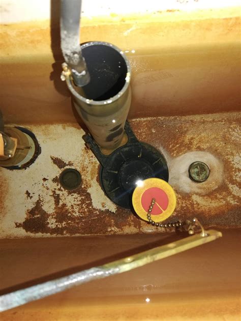 The flush valve (flapper) is leaking slightly, lowering the water level in the tank. Flapper Valve leaking, what kind will replace it? : Plumbing