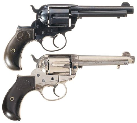 Two Colt Model 1877 Lightning Double Action Revolvers A Colt