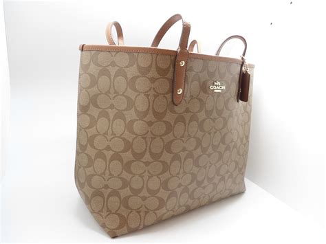 Coach Reversible Pvc City Signature Tote Buy Online In Uae Shoes