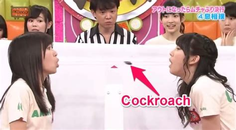 Crazy Japanese Game Show Sees 2 Girls Battle To Try And Blow A Cockroach Into Each Others