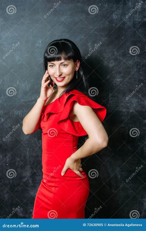 Beautiful Young Model Woman In Red Dress Posing Over Black Slate Stock Image Image Of Glamour