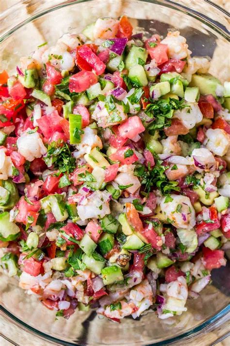 A delicious twist on traditional shrimp ceviche, this version is vibrant and green and full of flavor! The BEST homemade recipe for Ceviche loaded with baked ...