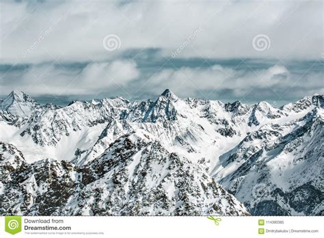 Winter Landscape In The Soelden High Snow Capped Mountains Against The