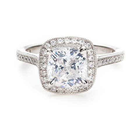 They can be found in square and elongated or rectangular shapes, and they're a beautiful compromise between round brilliant and princess cut shapes. Cushion Cut Diamond: Thin Pave Band Cushion Cut Diamond Engagement Ring
