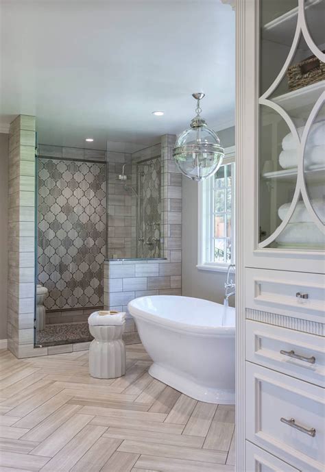 The bathroom also features hardwood flooring and classy ceiling lights. 32 Best Master Bathroom Ideas and Designs for 2021