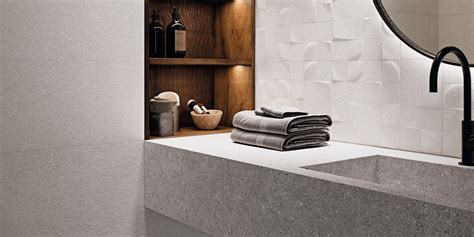 Find stylish tile for every room at lowe's. Kone Mate 30x90 / 60x60. Textured stone look bathroom wall ...