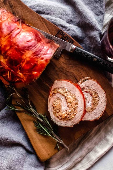 Prosciutto Wrapped Pork Tenderloin With Fennel And Rice Stuffing