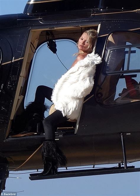Topless Kate Moss Fearlessly Dangles Out Of Helicopter Daily Mail Online