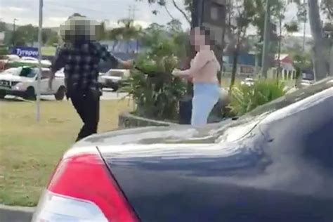 two women have bizarre road rage brawl where they rip each other s clothes off in the middle of