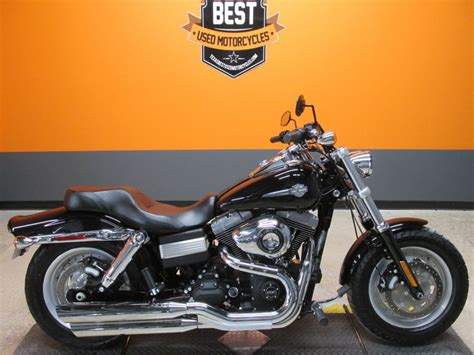 This beefy handlebar is truly reminiscent of an aggressive quarter mile monster. 2012 Harley-Davidson Dyna Fat Bob | American Motorcycle ...