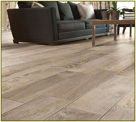 Wood look tiles are part of the key trends in the indoor and outdoor floor, capturing the beauty of natural timber and combining it with the durability of porcelain tiles. Lowes Porcelain Tile Looks Like Wood | Wood look tile, Wood tile floors, Wood grain tile