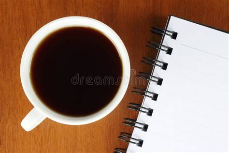Cup Of Coffee With Notepad Pen And Crumpled Paper Stock Photo Image