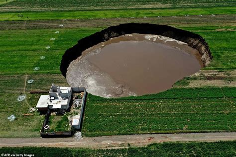 Large Sinkhole Opens In Mexico Near A House