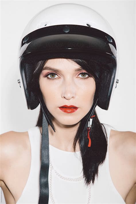 Closeup Of Stylish Girl In A Motorcycle Helmet On White Backgrou By