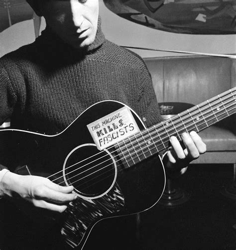 Woody Guthrie Influential Songwriter And Folk Singer