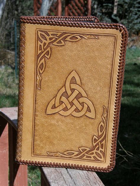 Hand Carved Celtic Trinity Knot Leather Notebook With A Laced Edge