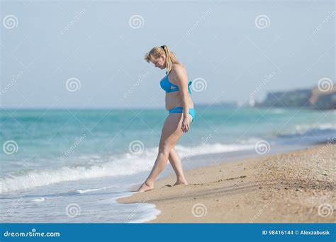 Overweight Woman In Swimsuit Entering In Sea Stock Photo Image Of Bikini Excess