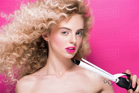 Beautiful Naked Girl With Long Curly Hair Holding Hair Curler And