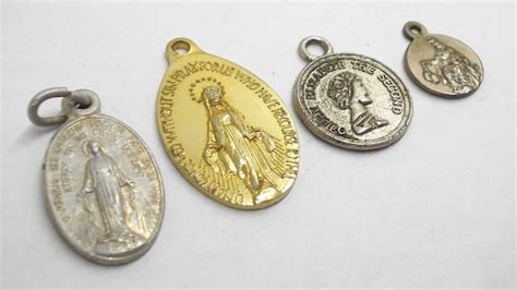 four different catholic medallions etsy
