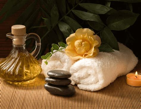download spa background massage oil white towels and a lit candle