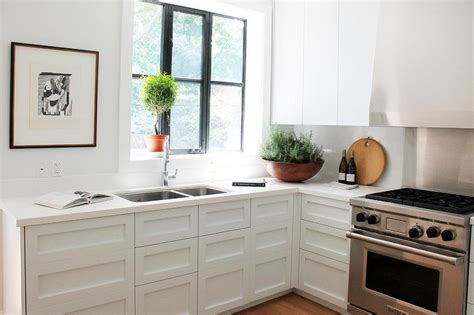How do these actually function? White Kitchen Cabinets Sans Hardware - Transitional - Kitchen