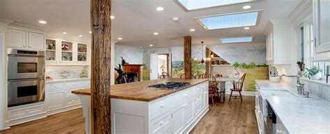 This is a terrific 1956 kitchen that shows the continuing popularity of early american design, but with modern notice this little drawers over the stove….those seem to be coming back in style if you ever look at new. House of the Week: Modern Touches in a True Colonial ...
