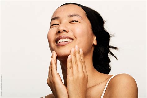 Asian Woman Natural Portrait Smiling Facial Lotion Hydration Korean Skincare Routine Del