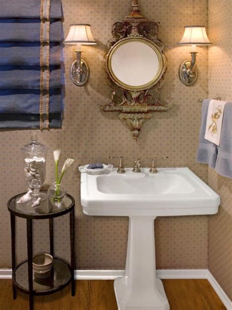 There's not much space to work with when designing a powder room, so keep. Elegant Powder Room With Stunning Pedestal Sink and Ornate ...