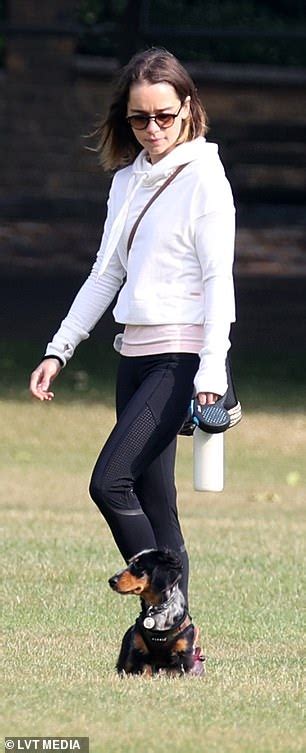 Emilia Clarke Keeps Things Casual In A White Hoodie And Leggings As She