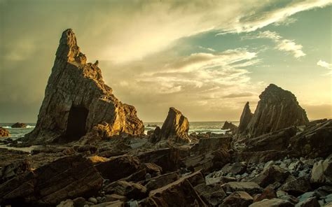 Download Wallpaper 2560x1600 Beach Rocks Stones Coast Sky