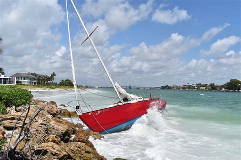 Authorities Working To Remove Sailboat Grounded For A Month On Longboat