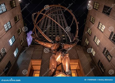 Statue Of Atlas Holding The World At Rockefeller Center At Night