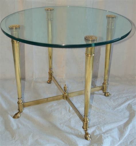 The average selling price for a brass end glass square table at 1stdibs is $2,600, while they're typically $700 on the low end and $4,800 for the highest priced. La Barge Classic Brass and Glass Top End Table, Italy, circa 1965 For Sale at 1stdibs