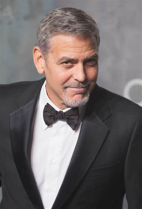 While his young twins play outside, he talks about outsmarting war criminals, battles with boris and dinnertime debates with. George Clooney looks sharp at OMEGA anniversary event
