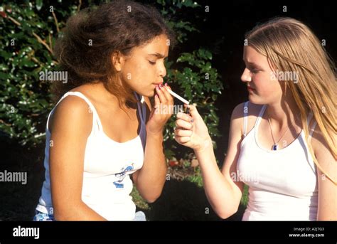 Young Teenage Girls Smoking Stock Photo Alamy