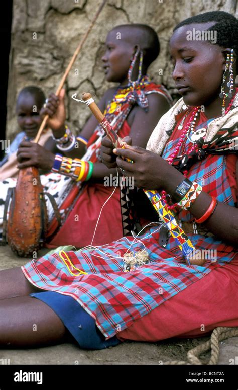 Maasai Women Making Jewellery Masai Mara Kenya Stock Photo Alamy