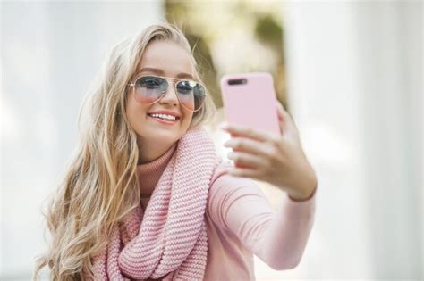 Premium Photo Attractive Young Woman Taking Selfie Outdoor