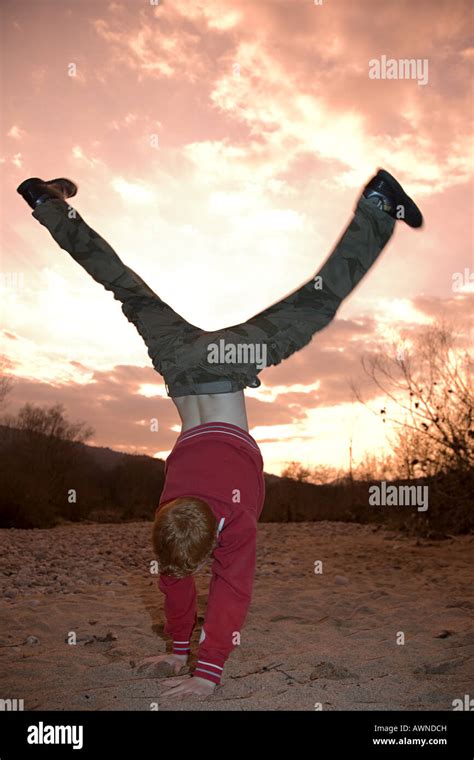 Boy Doing Handstand Stock Photo Alamy