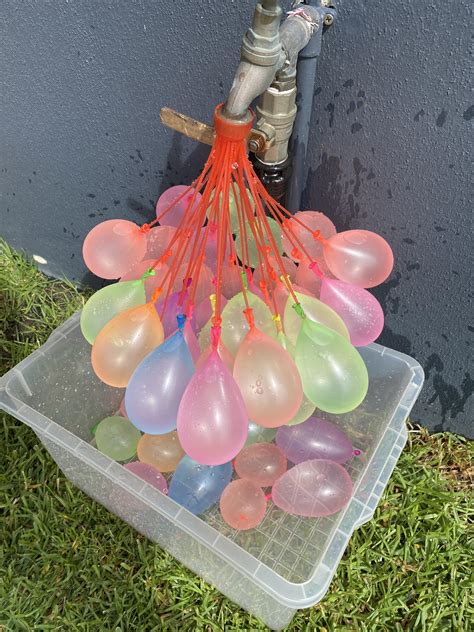 A Quick Way To Fill Up Water Balloons Theres Bands On The Ends So They Just Drop Off And Self