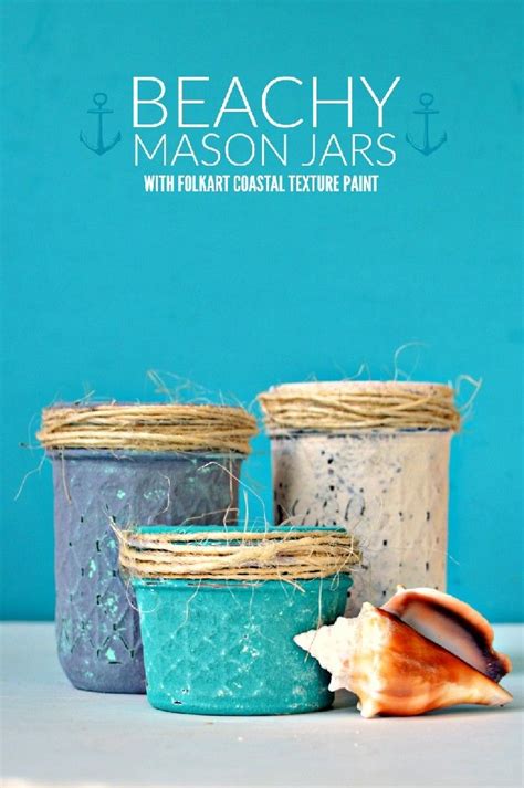 Three Jars With Sea Shells In Them And The Words Beachy Mason Jars