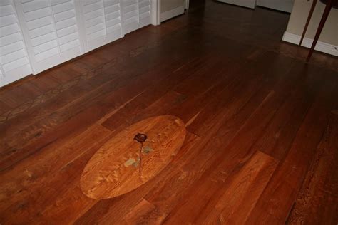A Wooden Floor With A Clock On It